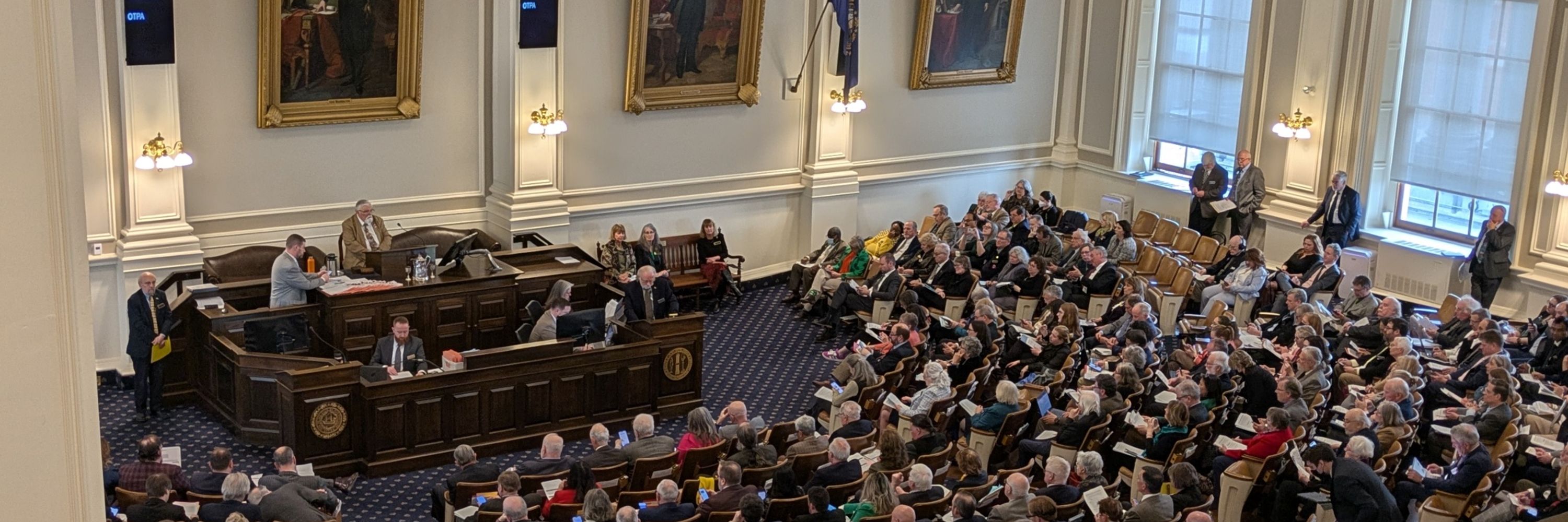 overhead view of the NH House legislative chamber